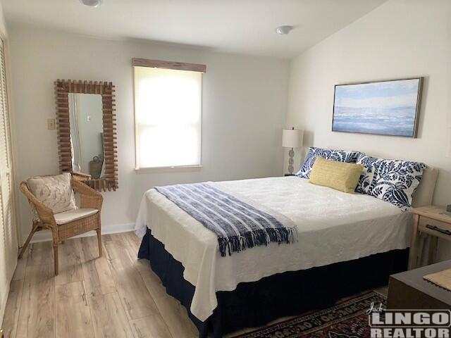 5+snug+queen+bedroom 5 SNUG HARBOR  Rental Property