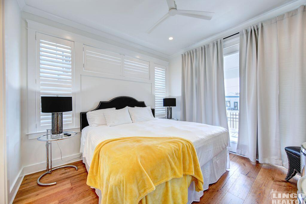 77+lake+bedroom+with+yellow+blanket 77 LAKE AVENUE  Rental Property
