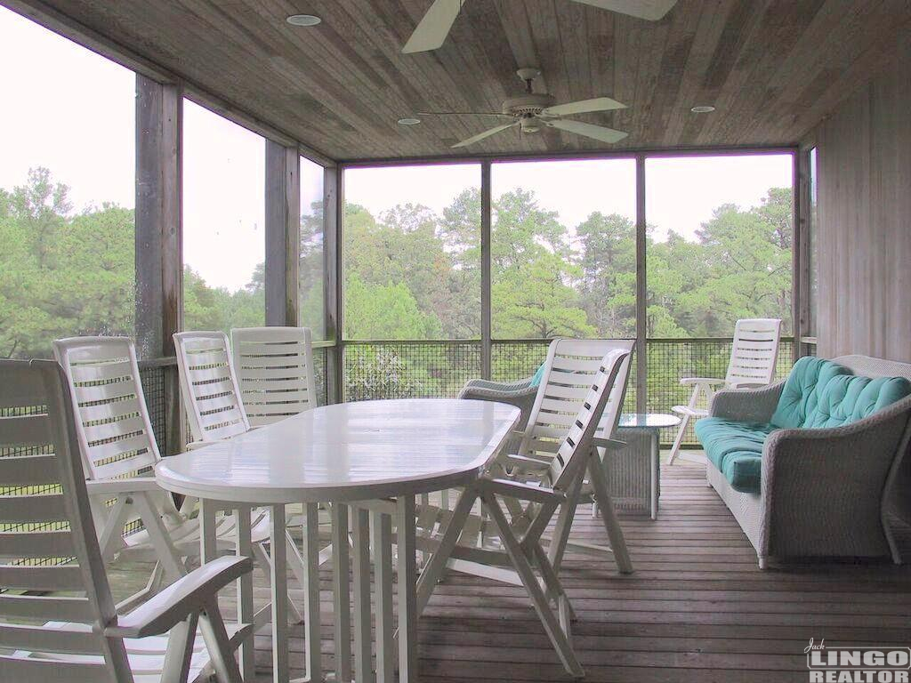 view_of_state_park_and_screened_porch 91 ANCHOR ROAD  Rental Property