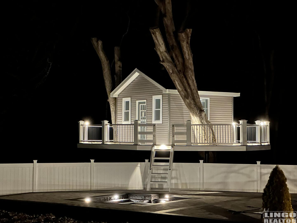 Tree+House+night 9 Greystone Drive Rental Property