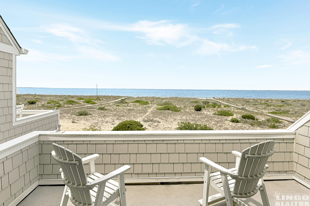 16+Pilot+Point+Back+Primary+Bedroom+Deck 16 Pilot Point Rental Property