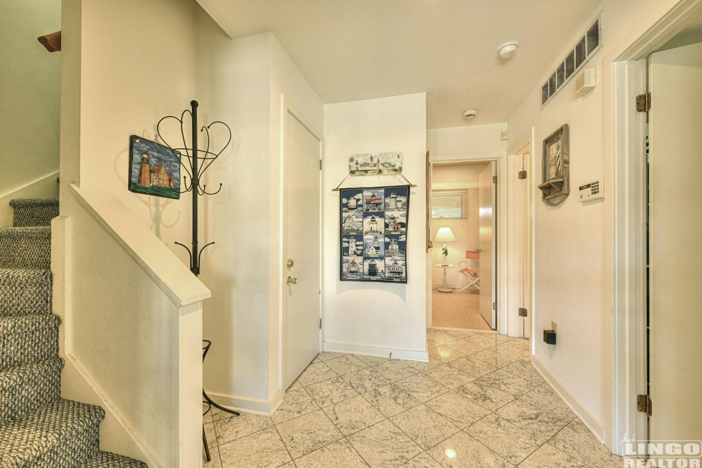 52+Port+Lewes+Foyer+2 53 Cape Henlopen Drive #52 Rental Property